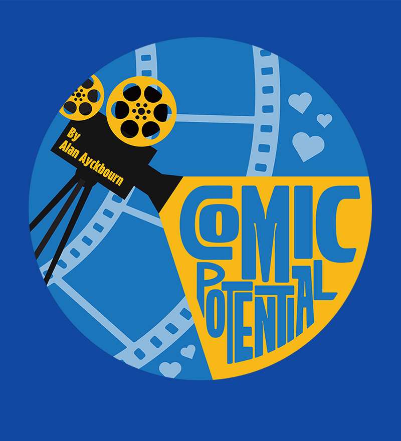 A reel to reel video camera with film and hearts in the background