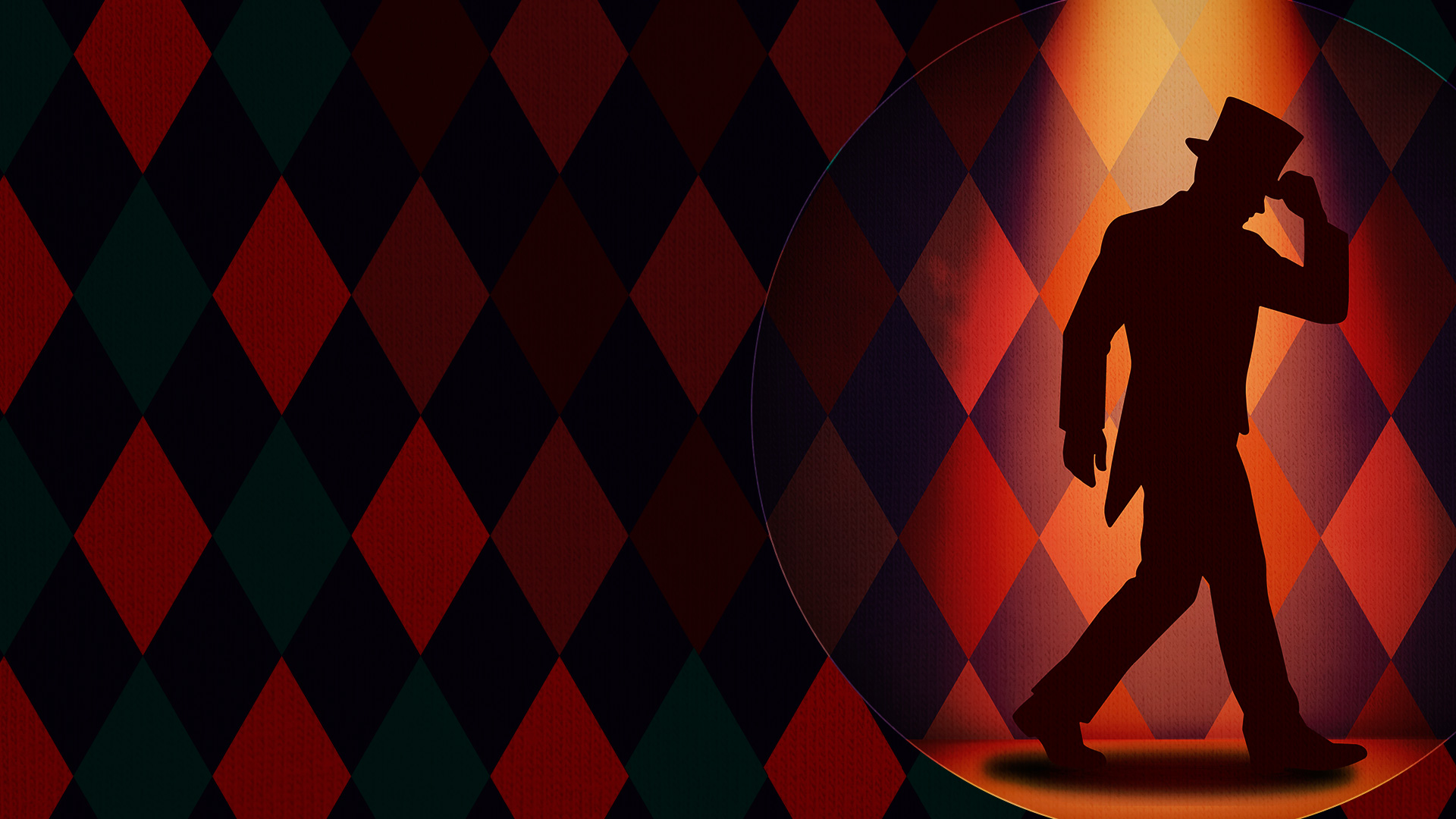 A man in a tuxedo and top hap stands in shadow in front of a diamond checked background with a spotlight shining on him.