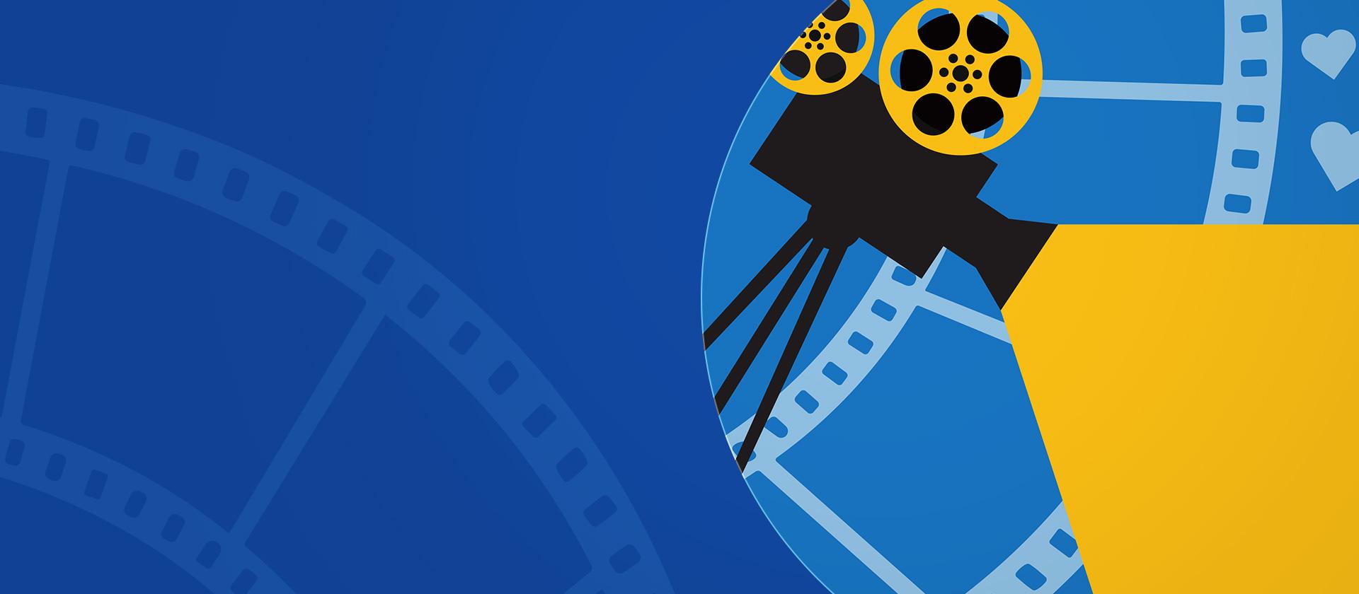 A reel to reel video camera with film and hearts in the background